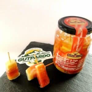 Pincho de queso de oveja con jamón en aceite